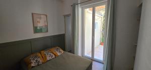 Appartements T2 avec terrasse en rdc de maison de ville : photos des chambres