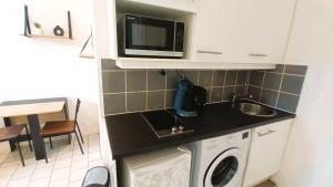 Appartements La Terrasse, T2 proche gare, Wifi, tv HD, grande terrasse : photos des chambres