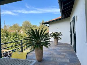 Villas Maison individuelle contemporaine avec piscine : photos des chambres