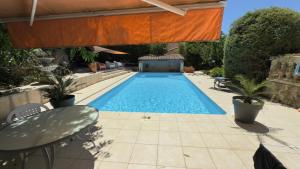 Maisons de vacances L’appartement du Micocoulier : photos des chambres