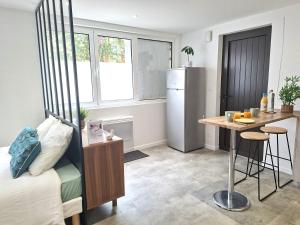 Appartements Au Petit Palois - Parking Gratuit - Proche Centre : photos des chambres