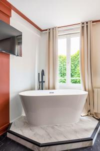 Appartements La Luxury - HyperCentre - Baignoire confort - Ambiance 5 etoiles : photos des chambres