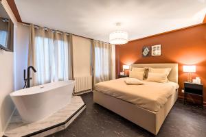 Appartements La Luxury - HyperCentre - Baignoire confort - Ambiance 5 etoiles : photos des chambres