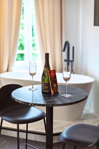 Appartements La Luxury - HyperCentre - Baignoire confort - Ambiance 5 etoiles : photos des chambres