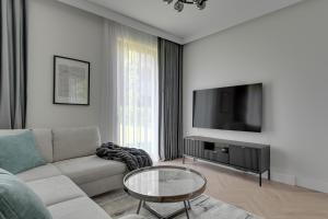 Nadmorski Dwór Premium Apartment with Parking Sauna & Gym by Lion Apartments