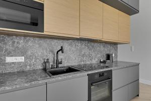 Nadmorski Dwór Premium Apartment with Parking Sauna & Gym by Lion Apartments