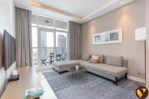 Vogue Vacation Homes, Business Bay Damac Maison Prive near Burj Khalifa and Dubai Mall, One Bedroom Apartment with Balcony, Canal and City Skyline View, Access toAmenities