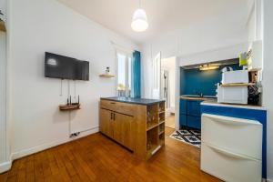 Appartements Lescapade Blue and Yellow 10min to Paris : photos des chambres