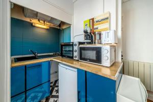 Appartements Lescapade Blue and Yellow 10min to Paris : photos des chambres