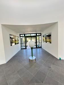 Appartements Ecrin Neuf au Coeur du Golf : photos des chambres