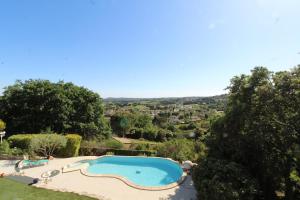Maisons de vacances Villa de reve avec piscine et vue : photos des chambres