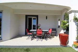 Maisons de vacances Villa de reve avec piscine et vue : photos des chambres