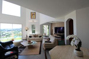 Maisons de vacances Villa de reve avec piscine et vue : photos des chambres