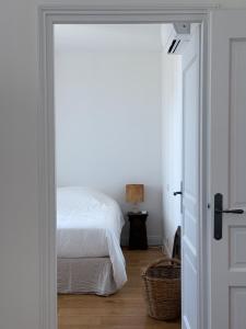 Appartements Le Central - Climatisation : photos des chambres