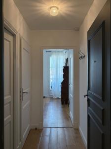 Appartements Le Central - Climatisation : photos des chambres