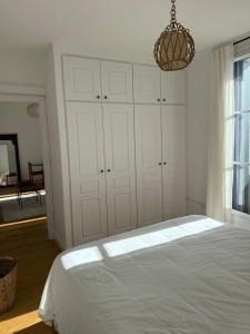 Appartements Le Central - Climatisation : photos des chambres