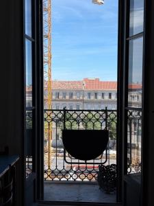 Appartements Le Central - Climatisation : photos des chambres