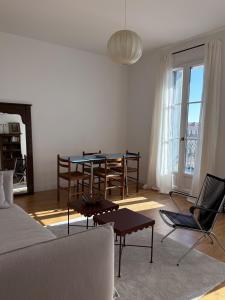 Appartements Le Central - Climatisation : photos des chambres