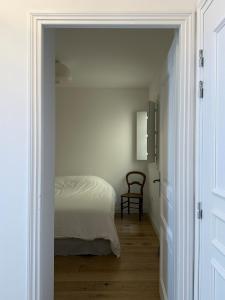 Appartements Le Central - Climatisation : photos des chambres