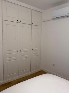 Appartements Le Central - Climatisation : photos des chambres