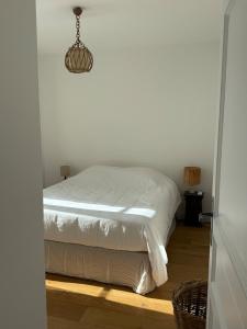 Appartements Le Central - Climatisation : photos des chambres