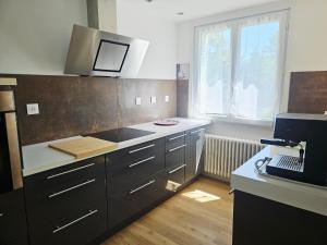 Appartements Appartement trois chambres avec jardin : photos des chambres