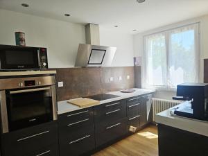 Appartements Appartement trois chambres avec jardin : photos des chambres
