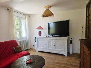 Appartements Appartement trois chambres avec jardin : photos des chambres
