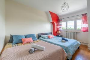 Appartements Appart 10personnes Jardin Parkings Voitures Velos,10min Centre Blois,40min Zoo Beauval : photos des chambres