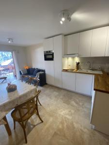 Appartements T2 4 PERS chalet des sapins ski au pieds : photos des chambres