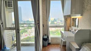 Studio Apartment JiExpo Kemayoran View -Min Stay 3 nights-