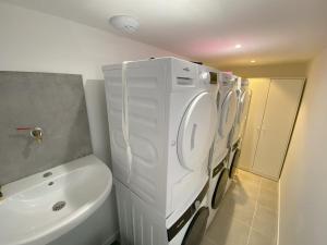 Appartements 2 logements Neuf Cosy avec Espaces Communs Premium Espace detente 21-22 : photos des chambres