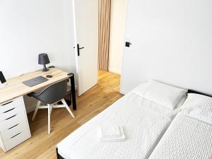Maisons de vacances L-Orangerie, Maison moderne avec jardin : photos des chambres