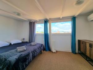 Appartements Centre ville - Triplex Les Cordeliers - 6 couchages -Air Conditionne : photos des chambres