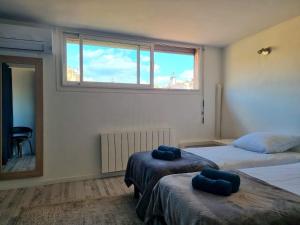 Appartements Centre ville - Triplex Les Cordeliers - 6 couchages -Air Conditionne : photos des chambres