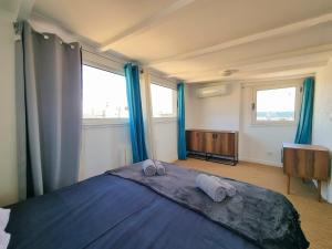 Appartements Centre ville - Triplex Les Cordeliers - 6 couchages -Air Conditionne : photos des chambres