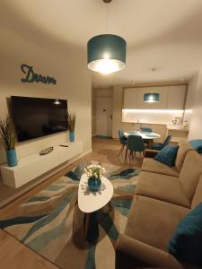 Apartament Whiteblue Dream 2 Kołobrzeg z ogródkiem & sauna & fitness & bawialnia dla dzieci