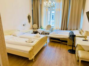 Comfort Quadruple Room room in Hotel Pension Baronesse