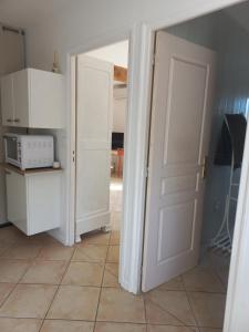 Appartements Logement 2 personnes cosy avec petit jardin : photos des chambres