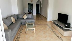 Appartement au RDC paisible avec jardin privé et accés piscine