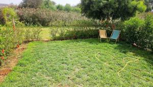 Appartement au RDC paisible avec jardin privé et accés piscine