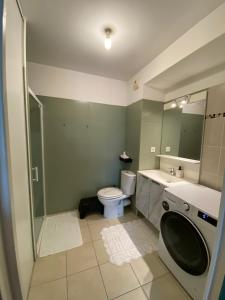 Appartements Charmant studio avec jacuzzi : photos des chambres