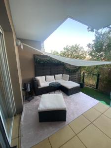 Appartements Charmant studio avec jacuzzi : photos des chambres