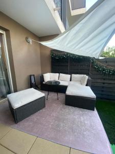 Appartements Charmant studio avec jacuzzi : photos des chambres