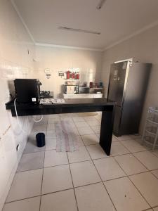 Casa na praia de Bertioga com Pscina e Churrasqueira - até 10 Pessoas