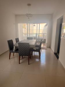 Casa na praia de Bertioga com Pscina e Churrasqueira - até 10 Pessoas