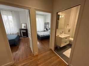 Appartements Le Cocon des thermes : photos des chambres