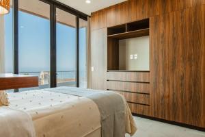 1st Floor Corner Unit with Rooftop Access to the Best Views in Cabo