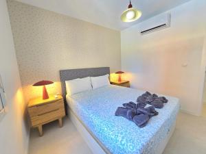 Sunshine Blue Skies and Seaview 2 Bedroom Apartment Seasonal Pool Free wifi and dedicated workspace by NAMASTE ELITE