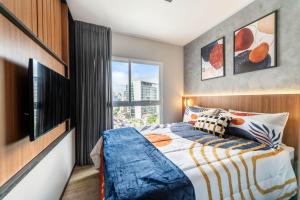 Apto executivo na Faria Lima - varanda, WiFi, ar-cond e garagem - Okaeri Home - Hoteles de 4 estrellas en São Paulo